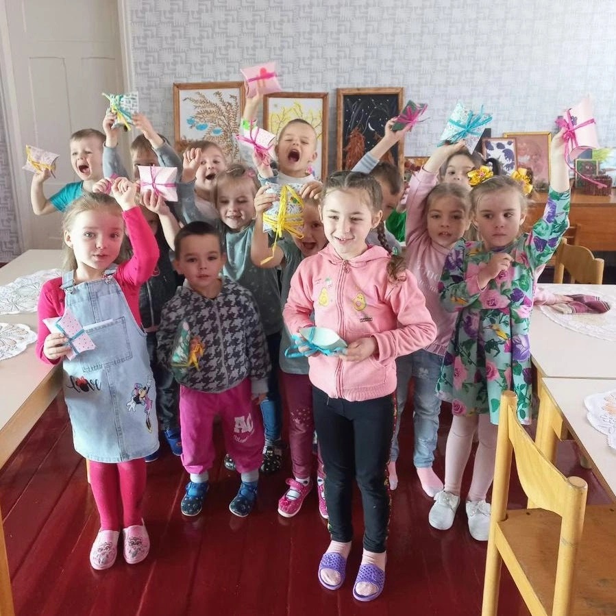 Kids receiving presents